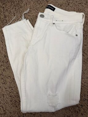 Mid Rise express women’s 4P White Skinny Jeans with Subtle Distress and raw hem